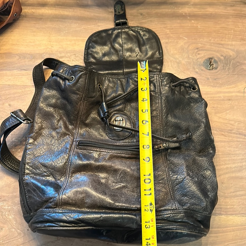 100% leather back pack